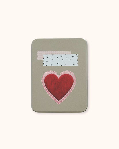 A large aesthetic tin box in silver, showcasing a Coquette red heart and retrograde washi tape collage on a minimalist textured surface. A functional and cute solution for deep desk organization.