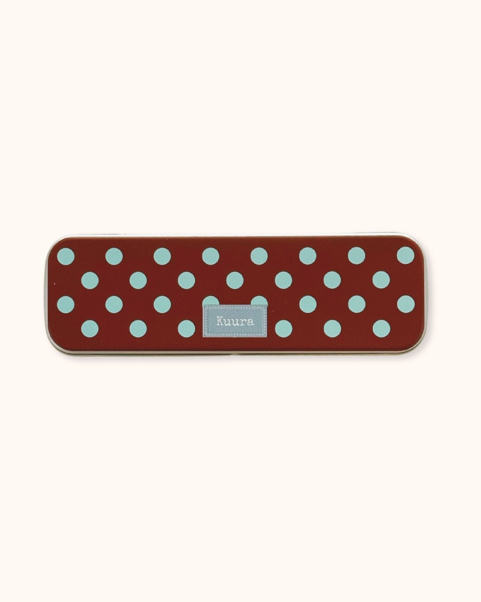 A kawaii pencil case in polka dots color a perfect free aesthetic stationery gift for Kuura customers who spend over $100