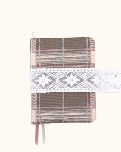 Kuura Museum Date A5 & A6 Journal & Notebook Cover in Brown Plaid, pink and blue check with an ivory lace band, front view. Autumn journaling essential