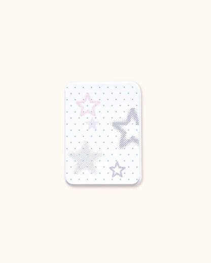 A medium-sized aesthetic trinket tin box in matte white, showcasing a cute mix of star shapes and polka dots in muted gray and blue. Perfect for comprehensive desk organization.