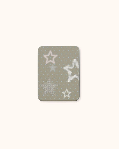 A medium-sized aesthetic tin box in silver with a minimalist muted starlight pattern on a textured background. A stylish choice for desk organization or carrying small items.