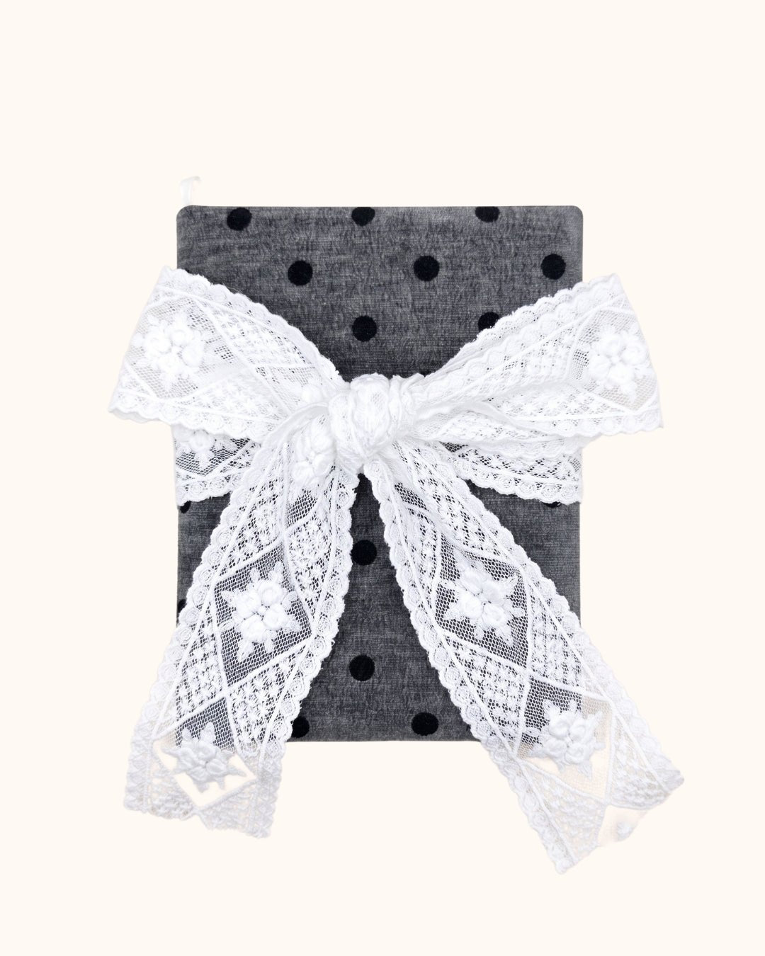Kuura Polka Dot A5 & A6 Journal & Notebook Cover in Charcoal, black dots under a big white lace bow with raised roses. French-inspired stationery
