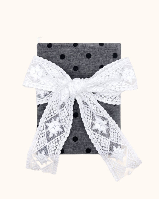 Kuura Polka Dot A5 & A6 Journal & Notebook Cover in Charcoal, black dots under a big white lace bow with raised roses. French-inspired stationery
