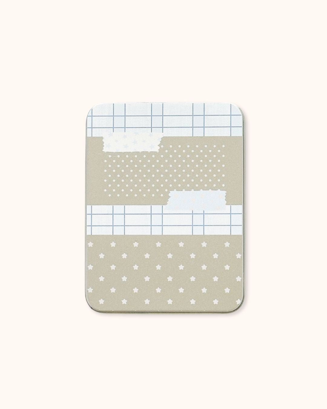 A large aesthetic tin box in silver, featuring a soft beige collage of stars and grid patterns.