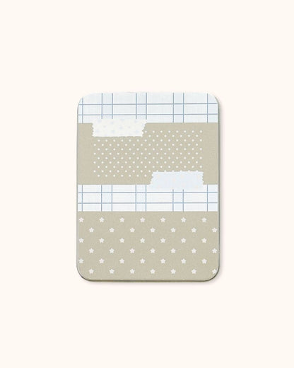 A large aesthetic tin box in silver, featuring a soft beige collage of stars and grid patterns.