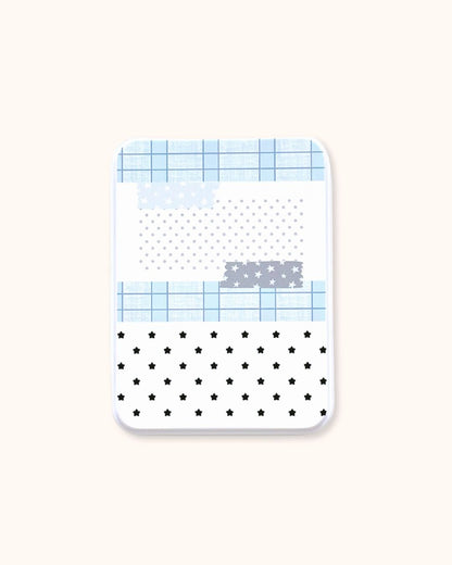 A large aesthetic trinket tin box in matte white, showcasing a cute mix of stars, polka dots, and blue grids.