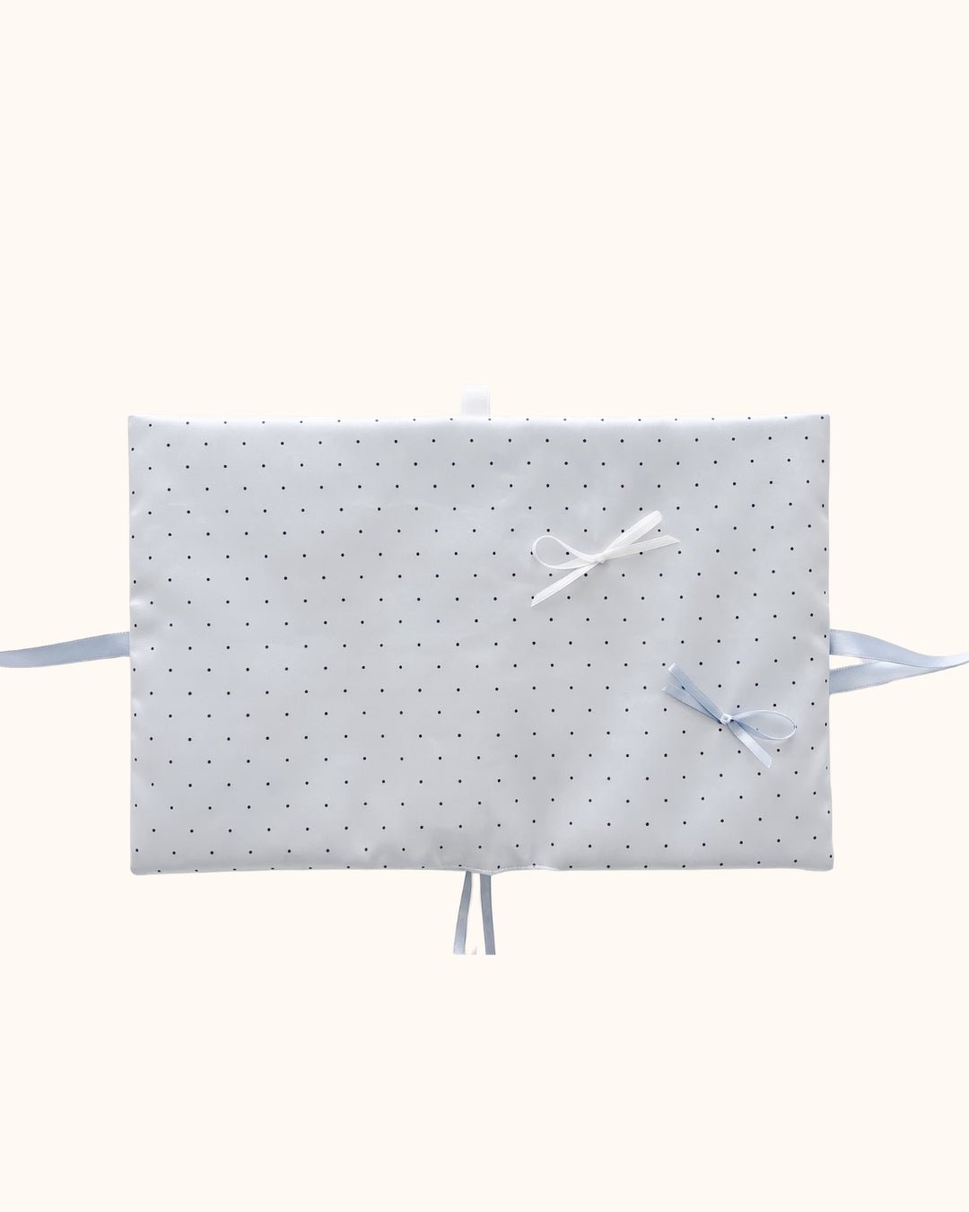 Kuura Reverie A5 & A6 Journal & Notebook Cover in Misty Blue Polka Dots, opened flat with blue satin ribbon ties on both sides. Pastel desk accessory
