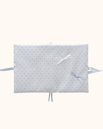 Kuura Reverie A5 & A6 Journal & Notebook Cover in Misty Blue Polka Dots, opened flat with blue satin ribbon ties on both sides. Pastel desk accessory